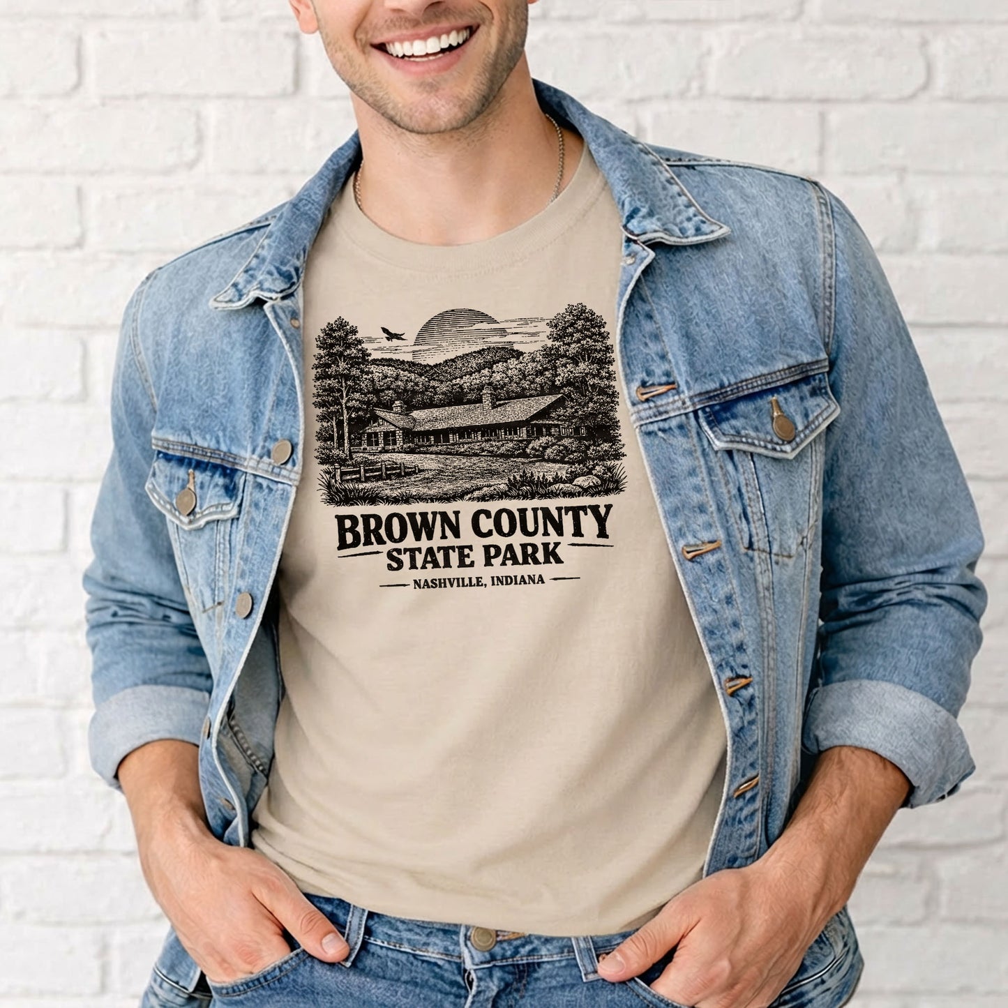man wearing brown county state park shirt on trail outdoor hiking setting