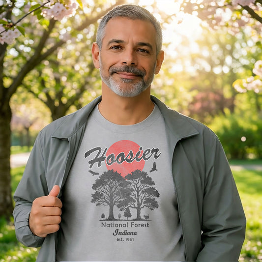 person wearing hoosier national forest sunset graphic t shirt with indiana outdoor design