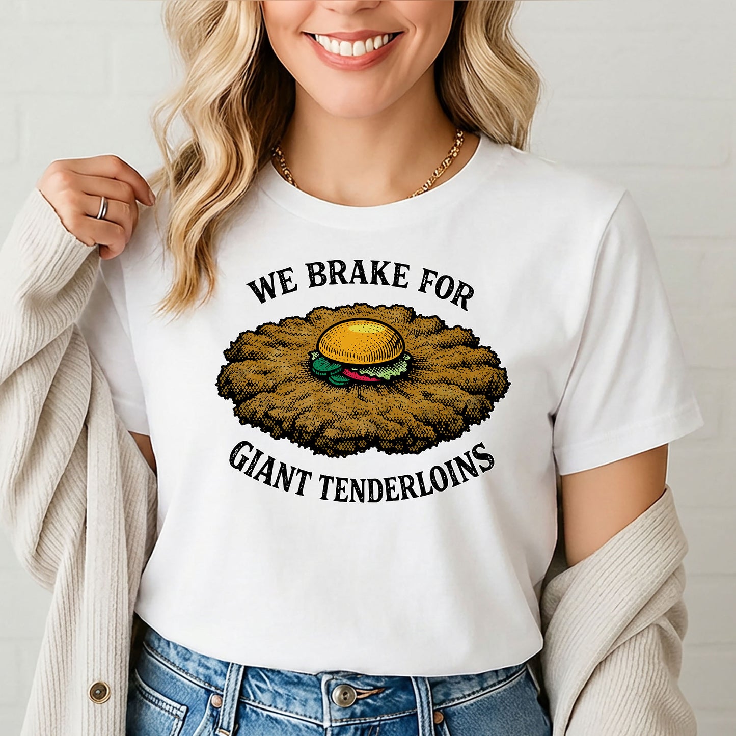 Woman wearing white funny tenderloin sandwich t shirt styled casually with jeans