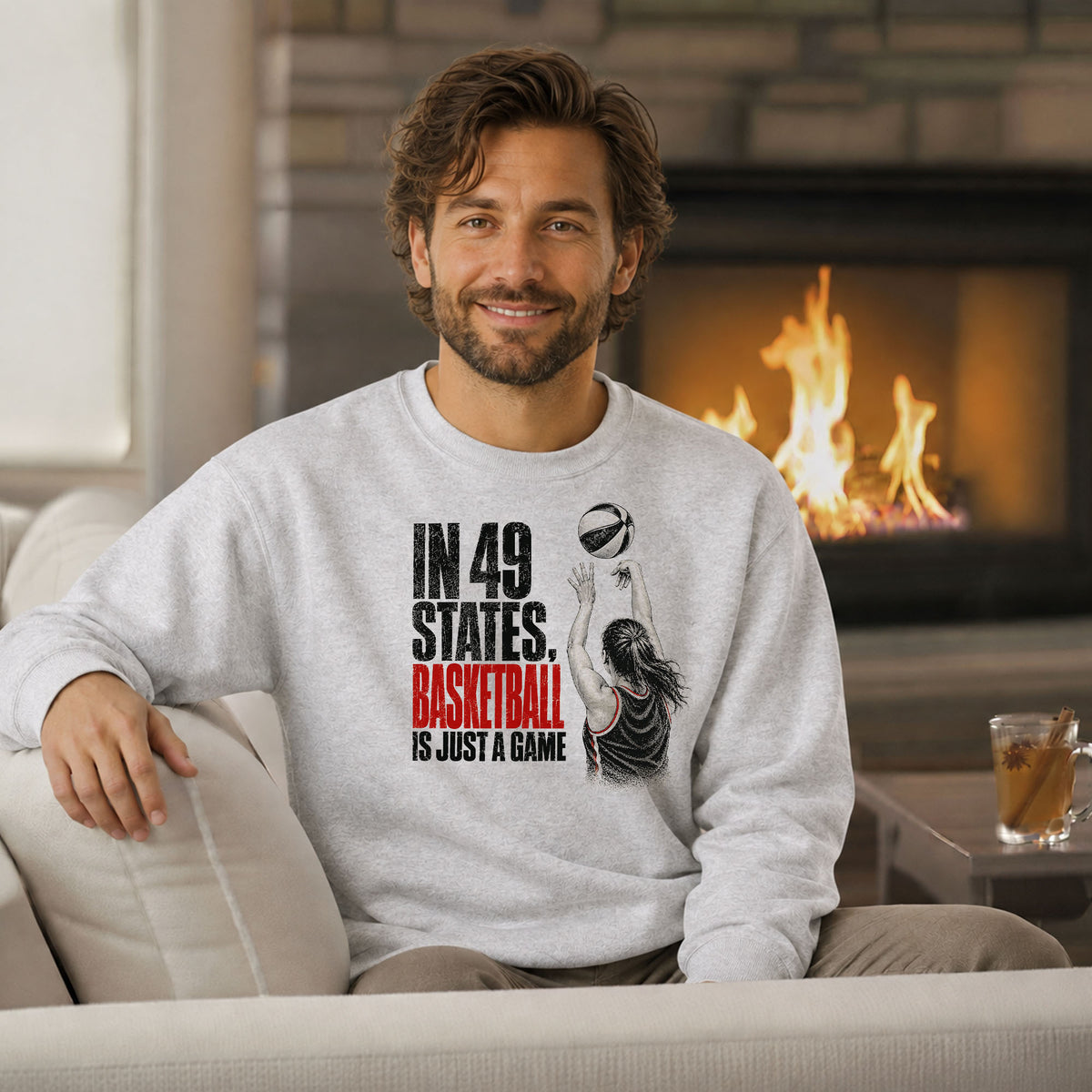 Indiana basketball sweatshirt graphic reading In 49 States Basketball Is Just a Game with a female basketball player taking a shot.