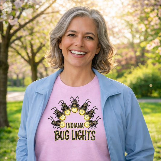 woman wearing indiana bug lights vintage firefly graphic t shirt outdoors in spring.