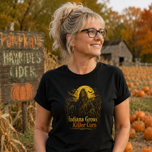 Female model wearing spooky Indiana scarecrow t-shirt outdoors in autumn setting