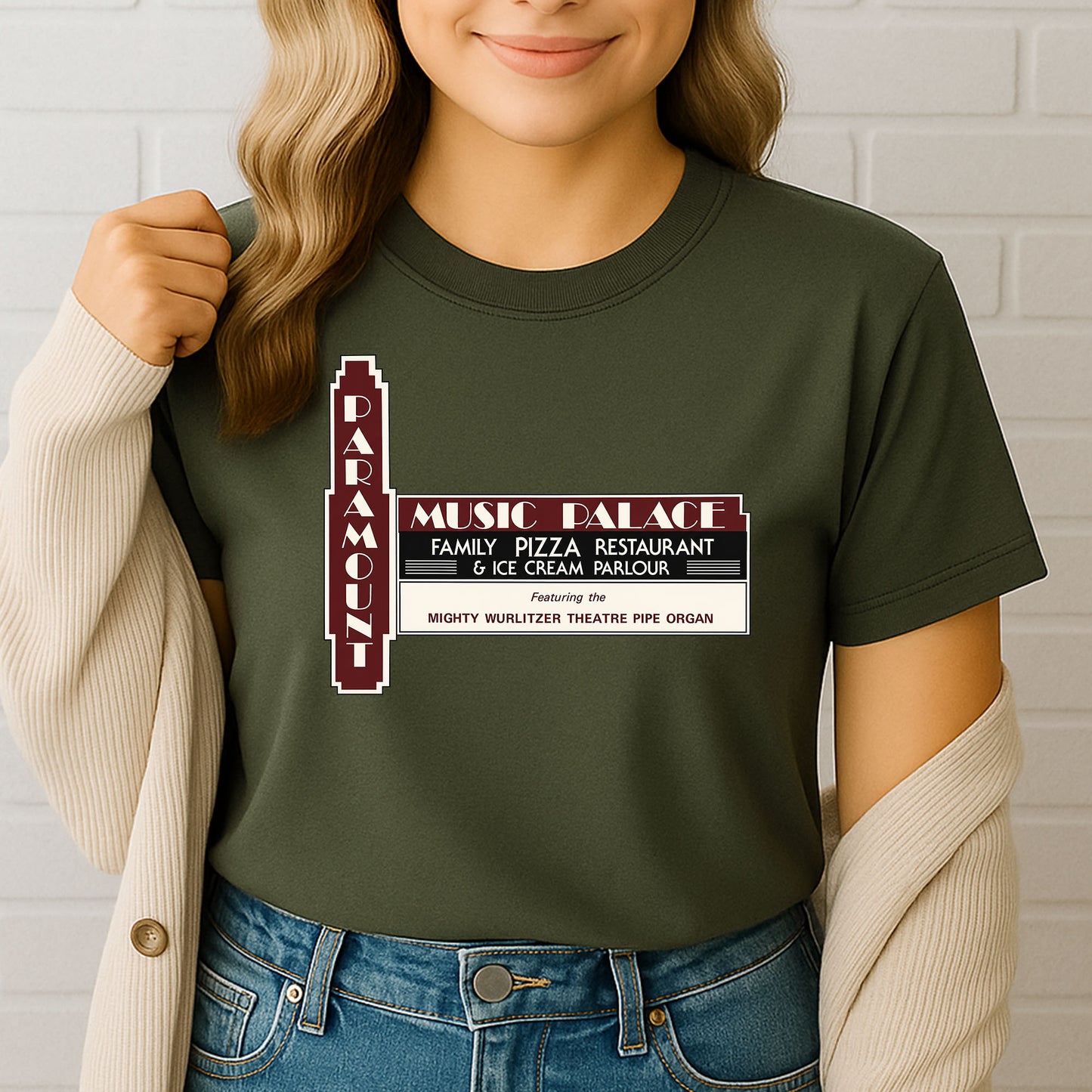 Female model wearing vintage Indy landmark shirt against white brick background